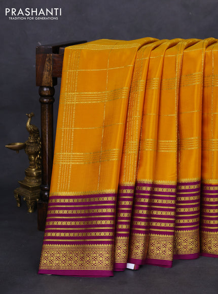 Pure mysore silk saree mustard yellow and purple with allover zari checked pattern and zari woven border