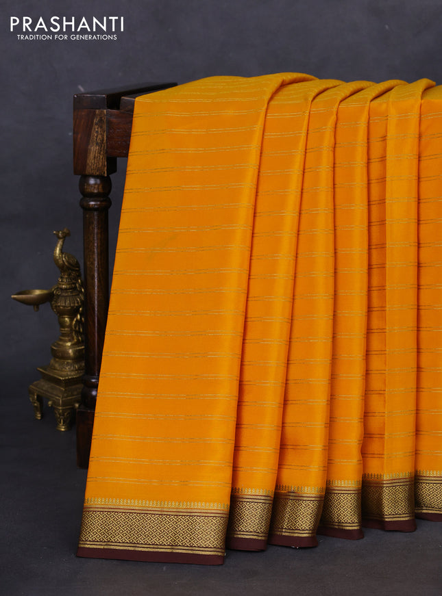 Pure mysore silk saree mustard yellow and brown with allover zari weaves and zari woven border