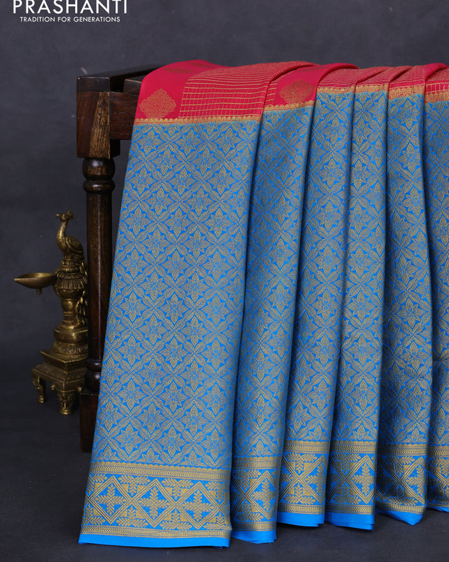 Pure mysore silk saree peach pink and cs blue with allover zari checks & buttas and long rich zari woven border