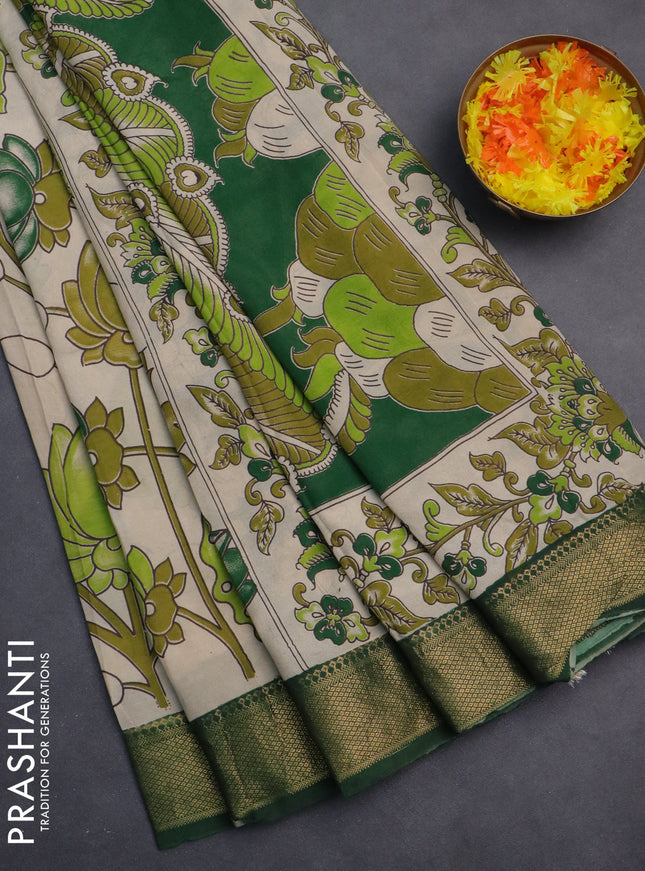 Kalamkari semi silk saree beige and green with allover prints and zari woven border