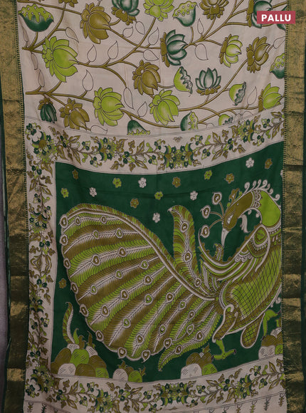 Kalamkari semi silk saree beige and green with allover prints and zari woven border