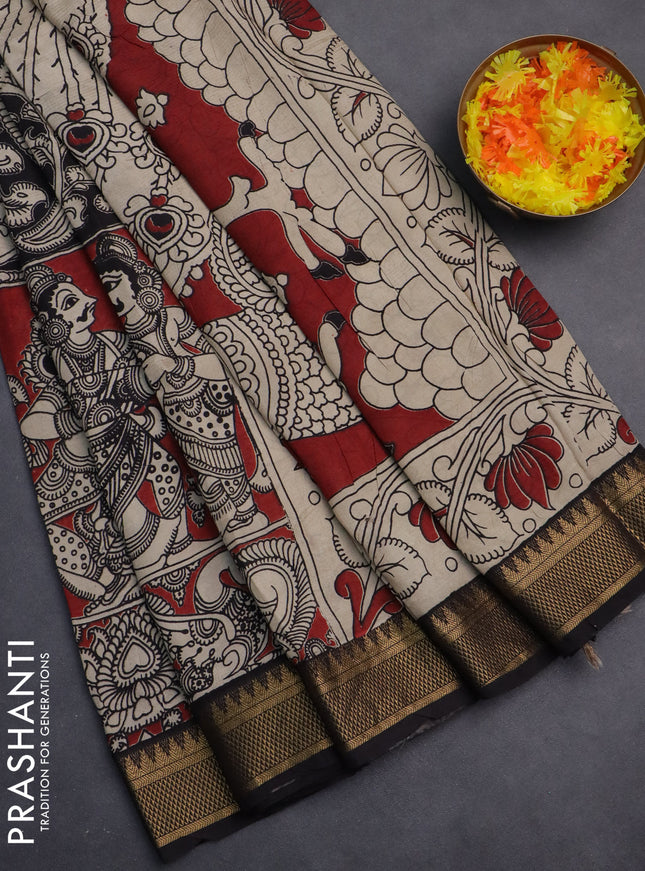 Kalamkari semi silk saree maroon and black with allover prints and zari woven border