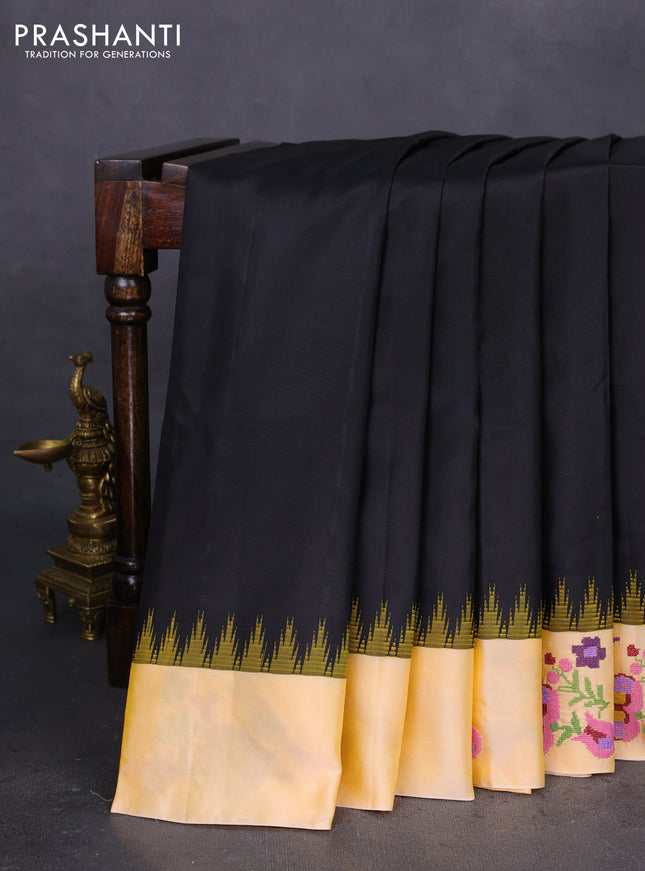 Pure gadwal silk saree black and yellow with plain body and embroided butta border