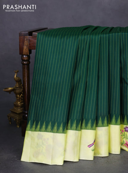 Pure gadwal silk saree green and lime yellow with allover stripes pattern and embroided butta border