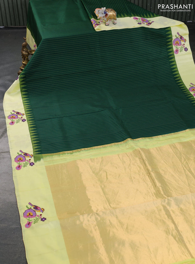 Pure gadwal silk saree green and lime yellow with allover stripes pattern and embroided butta border