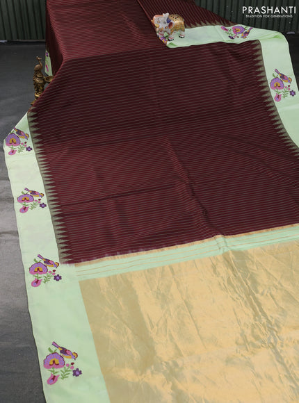 Pure gadwal silk saree deep maroon and pista green with allover stripes pattern and embroided butta border