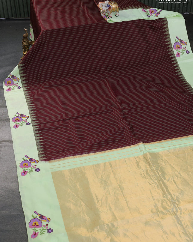 Pure gadwal silk saree deep maroon and pista green with allover stripes pattern and embroided butta border