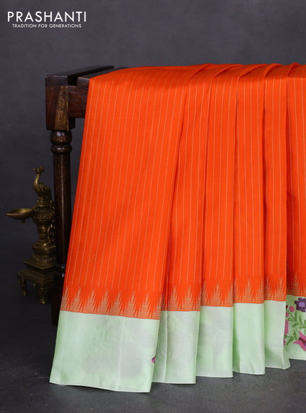 Pure gadwal silk saree orange and pista green with allover stripes pattern and embroided butta border
