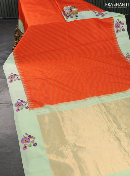 Pure gadwal silk saree orange and pista green with allover stripes pattern and embroided butta border