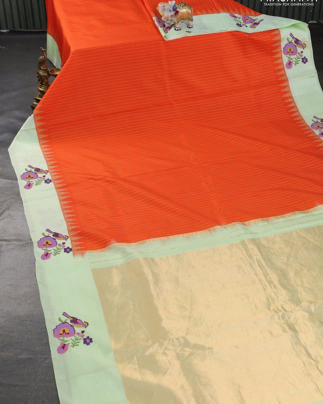 Pure gadwal silk saree orange and pista green with allover stripes pattern and embroided butta border