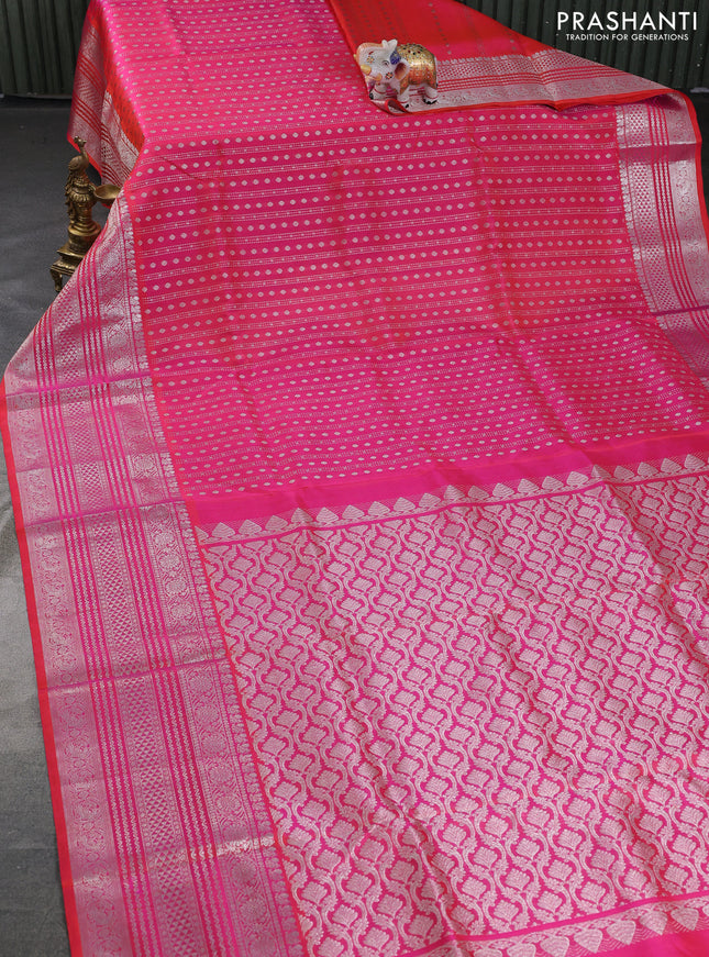 Venkatagiri silk saree dual shade of pinkish orange with allover silver zari weaves and silver zari woven border