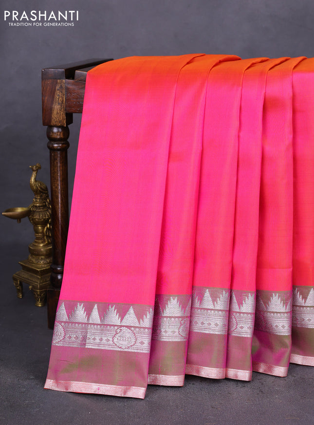 Venkatagiri silk saree dual shade of pinkish orange and dual shade of green with plain body and rettapet silver zari woven border