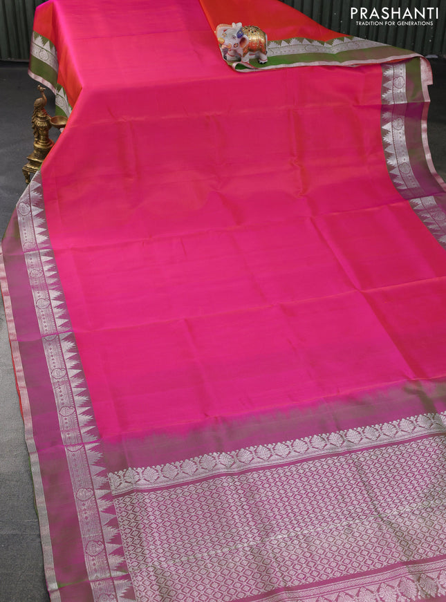 Venkatagiri silk saree dual shade of pinkish orange and dual shade of green with plain body and rettapet silver zari woven border