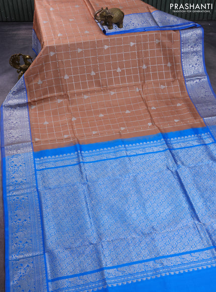 Venkatagiri silk saree sandal and blue with allover silver zari checks & temple buttas and elephant silver zari woven border