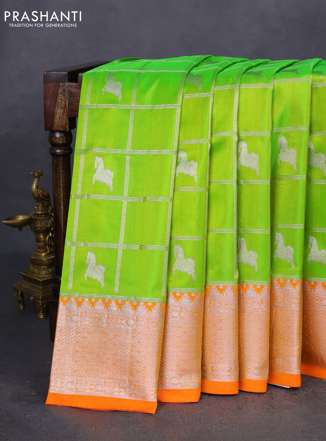 Venkatagiri silk saree light green and orange with allover silver zari checks & buttas and silver zari woven border