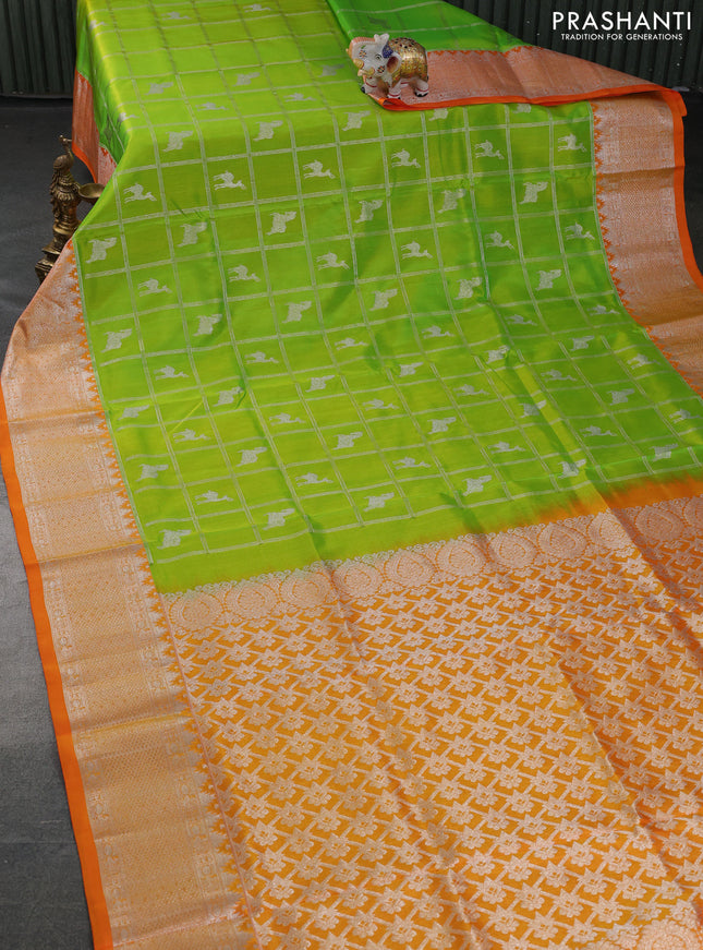 Venkatagiri silk saree light green and orange with allover silver zari checks & buttas and silver zari woven border