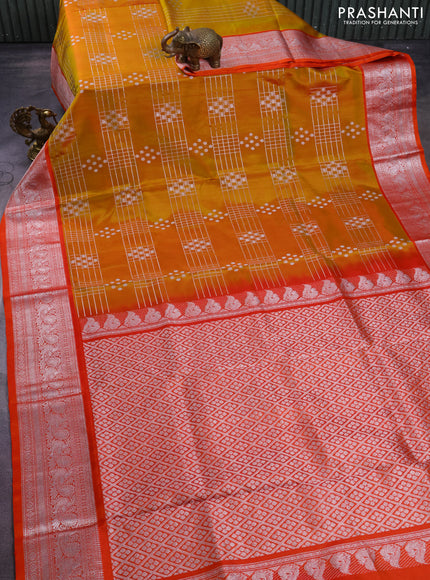 Venkatagiri silk saree dual shade of mustard yellow and orange with allover silver zari weaves and annam silver zari woven border
