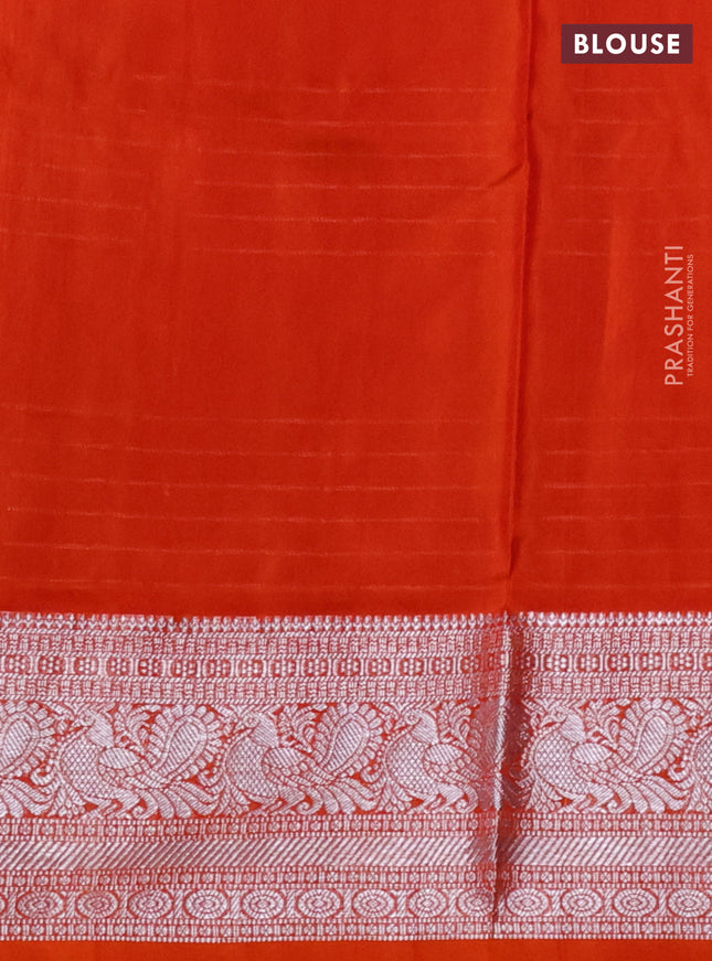 Venkatagiri silk saree dual shade of mustard yellow and orange with allover silver zari weaves and annam silver zari woven border