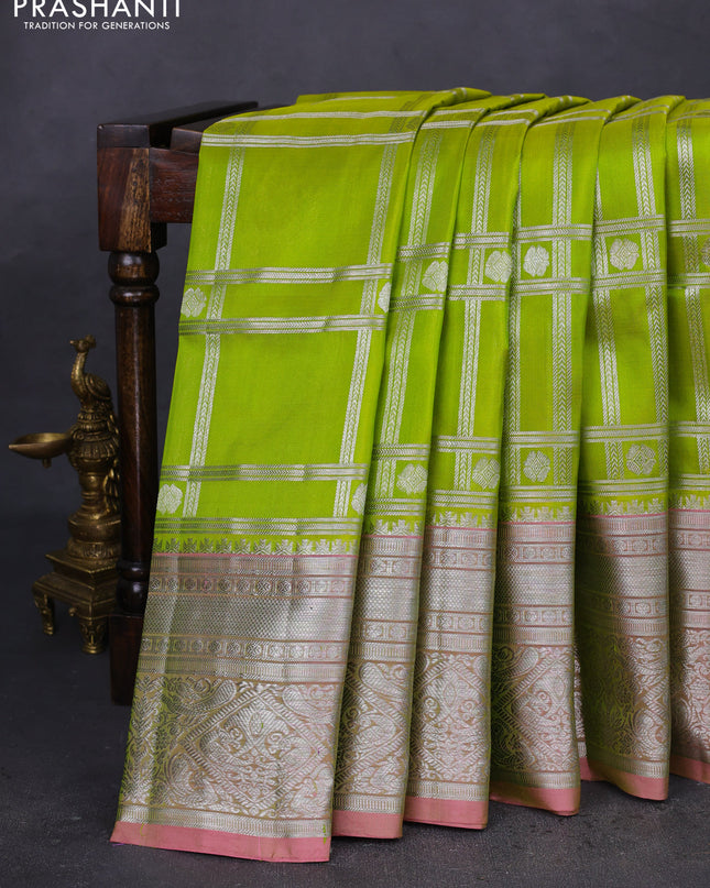 Venkatagiri silk saree lime gren and mild peach pink with allover silver zari checks & buttas and long silver zari woven border