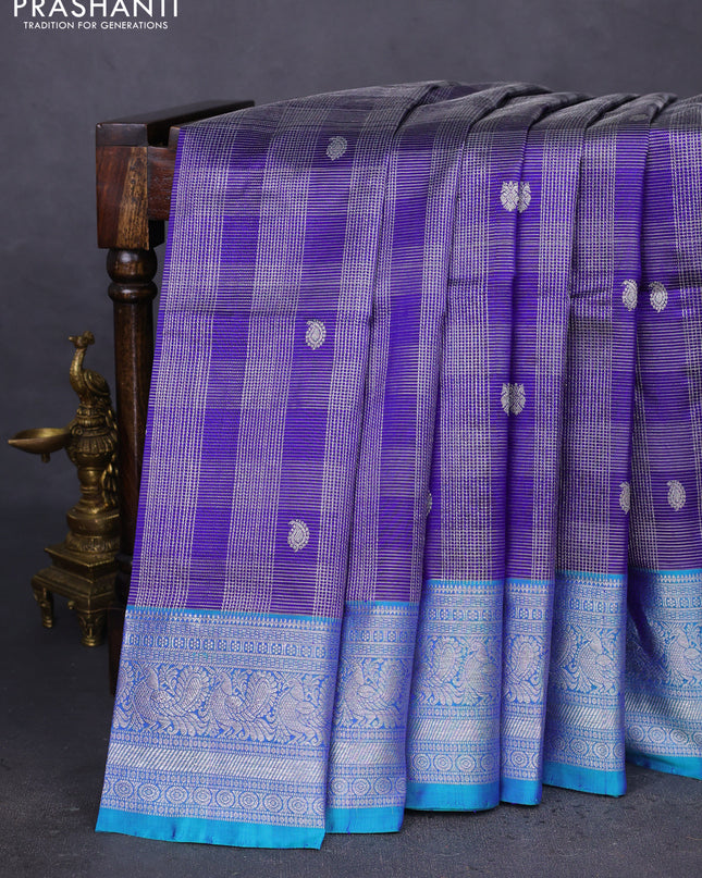 Venkatagiri silk saree blue and dual shade of teal green with allover silver zari woven brocade weaves and rich annam zari woven border
