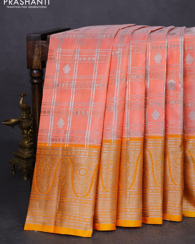 Venkatagiri silk saree orange shade and yellow with allover silver zari checks & buttas and long silver zari woven border