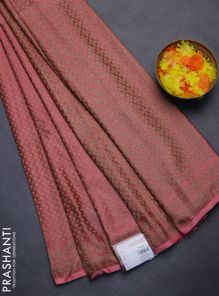 Banarasi semi silk saree peach shade with allover thread & zari woven butta weaves and woven border