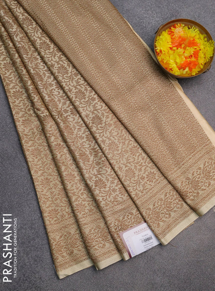 Banarasi semi silk saree cream with allover thread & zari woven butta weaves and woven border