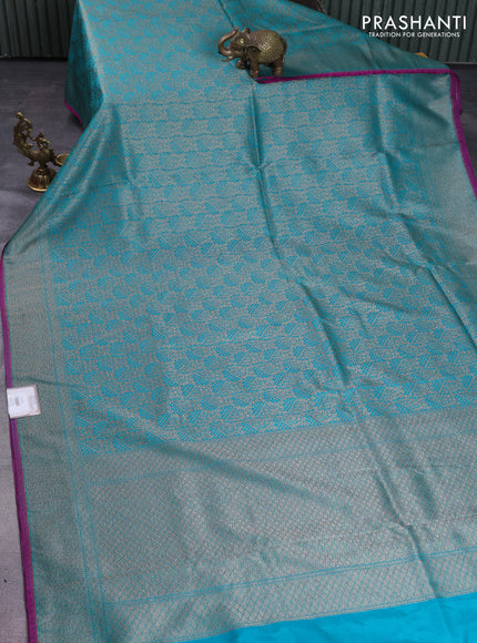 Banarasi semi silk saree teal green with allover thread & zari weaves and woven border