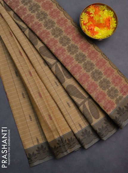 Nithyam cotton saree sandal and grey shade with allover thread weaves & buttas and thread woven border