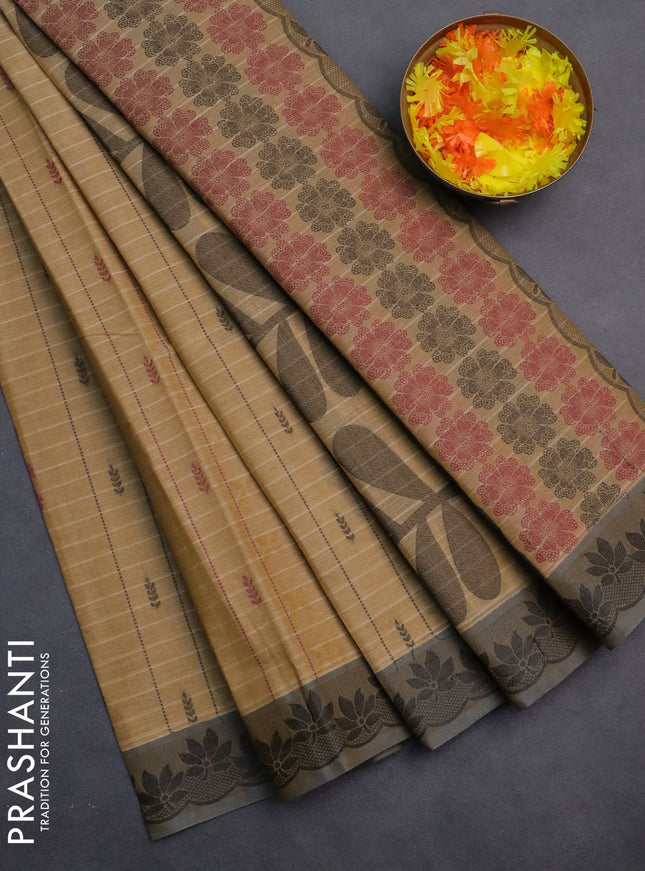 Nithyam cotton saree sandal and grey shade with allover thread weaves & buttas and thread woven border