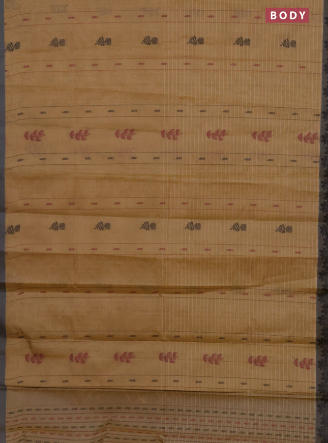 Nithyam cotton saree sandal and grey shade with allover thread weaves & buttas and thread woven border