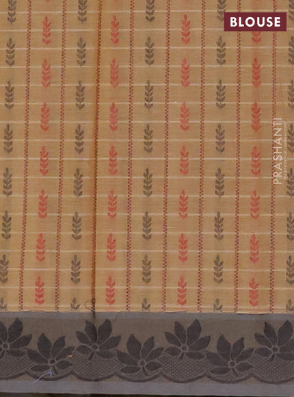 Nithyam cotton saree sandal and grey shade with allover thread weaves & buttas and thread woven border