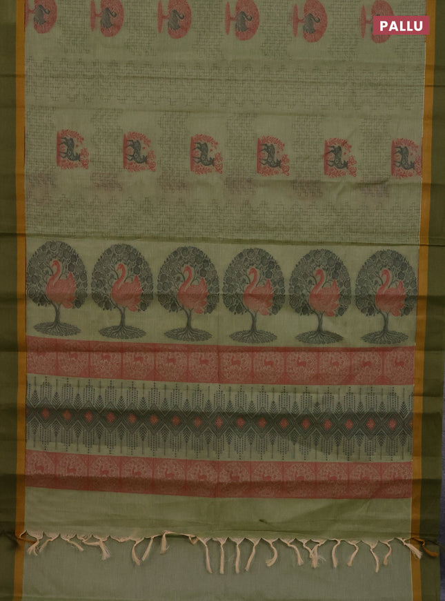 Nithyam cotton saree pastel green and sap green with allover thread weaves and simple border