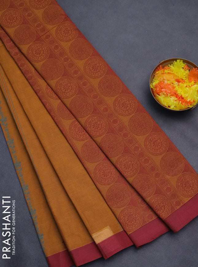 Nithyam cotton saree mustard and maroon with allover thread weaves and simple border