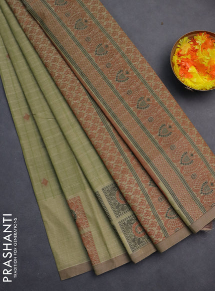 Nithyam cotton saree light green and beige with allover checks & thread buttas and thread woven butta border