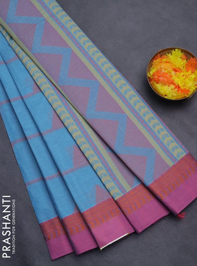 Nithyam cotton saree light blue and pink with thread woven buttas and thread woven border