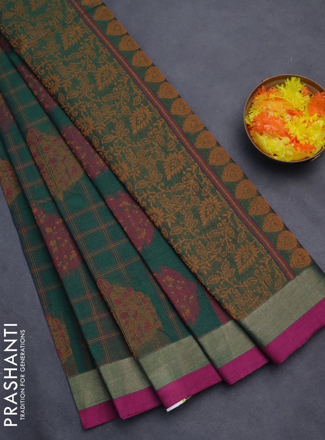 Nithyam cotton saree green and magenta pink with allover thread checked pattern & buttas and zari woven border