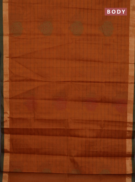 Nithyam cotton saree rust shade and green shade with allover thread checked pattern & buttas and zari woven border