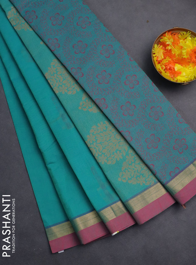 Nithyam cotton saree teal green and pink with thread woven buttas and zari woven simple border