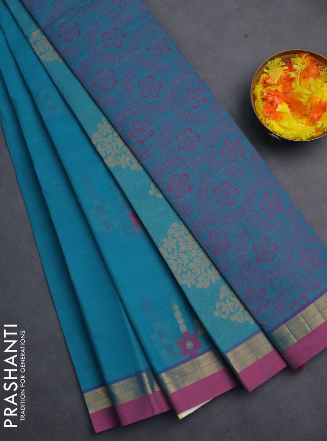 Nithyam cotton saree teal blue shade and pink with thread woven buttas and zari woven simple border