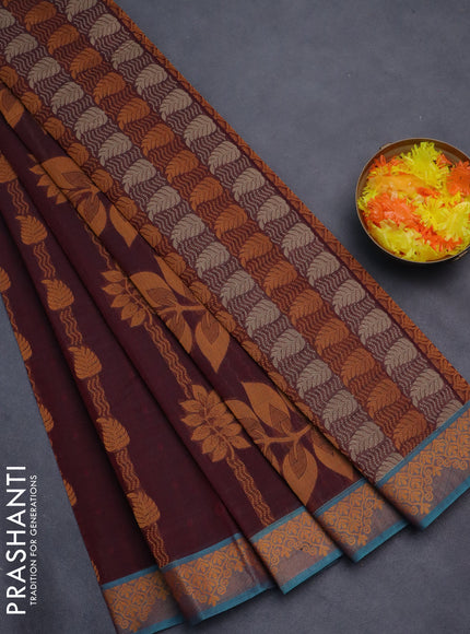 Nithyam cotton saree maroon and teal blue shade with allover self emboss & thread weaves and thread woven border