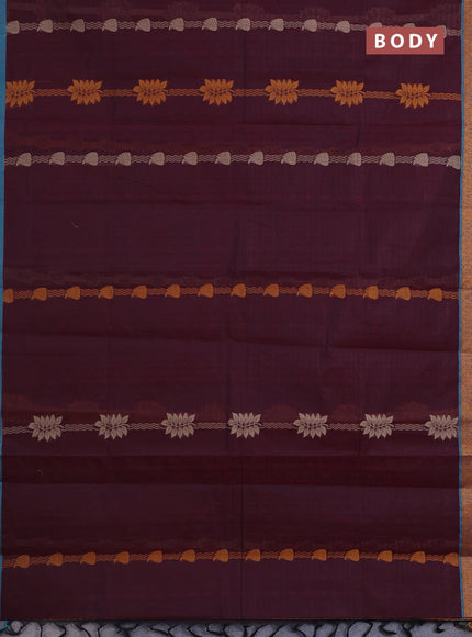 Nithyam cotton saree maroon and teal blue shade with allover self emboss & thread weaves and thread woven border