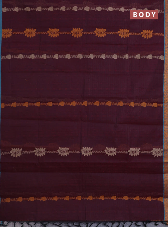 Nithyam cotton saree maroon and teal blue shade with allover self emboss & thread weaves and thread woven border