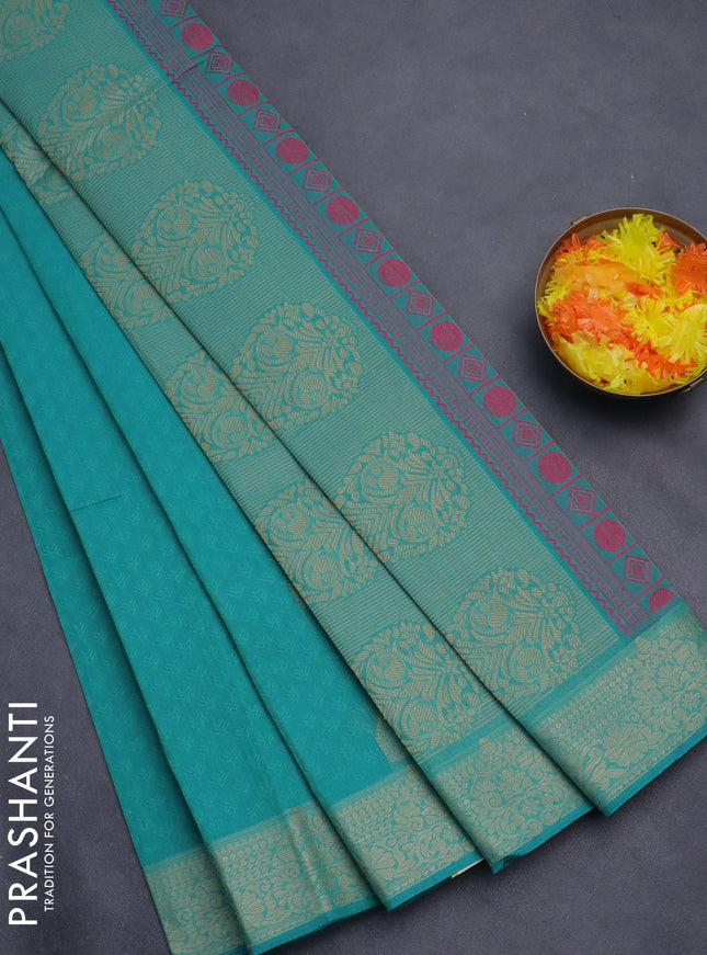 Nithyam cotton saree teal green with allover self emboss & thread weaves and thread woven border