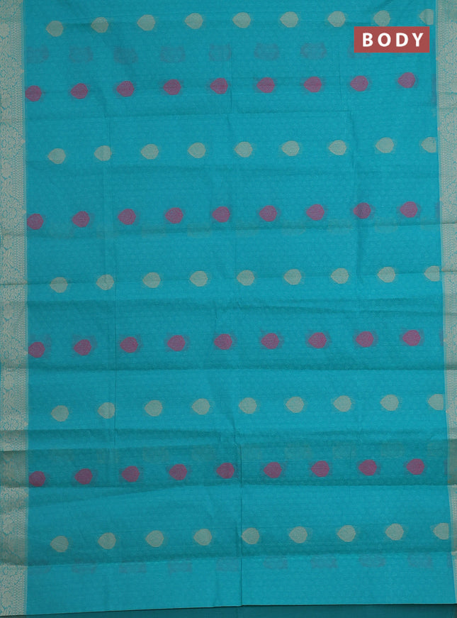 Nithyam cotton saree teal green with allover self emboss & thread weaves and thread woven border