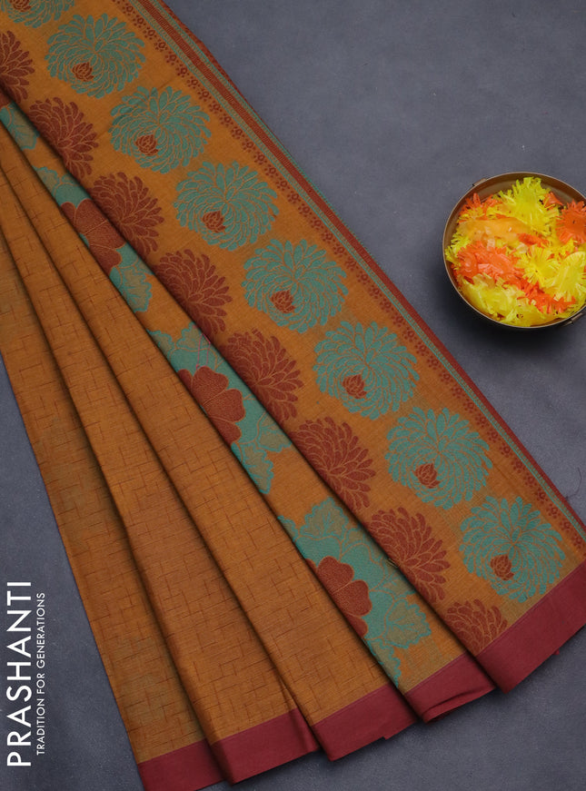Nithyam cotton saree dark mustard and maroon with allover thread weaves and simple border