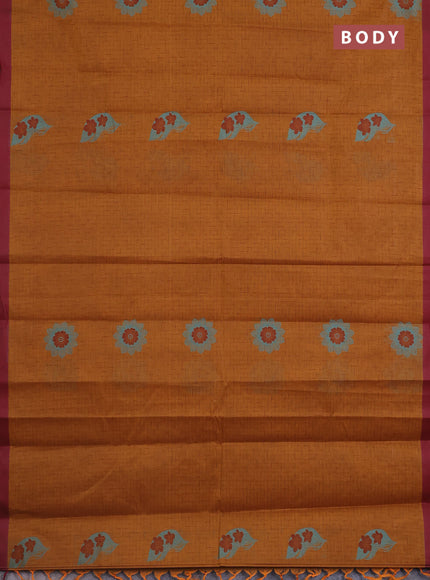 Nithyam cotton saree dark mustard and maroon with allover thread weaves and simple border