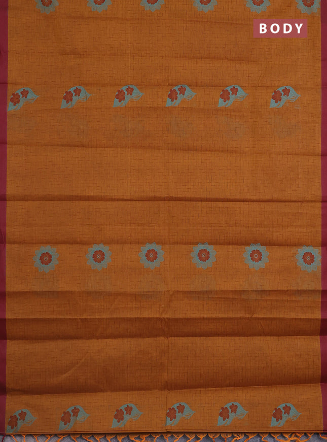 Nithyam cotton saree dark mustard and maroon with allover thread weaves and simple border