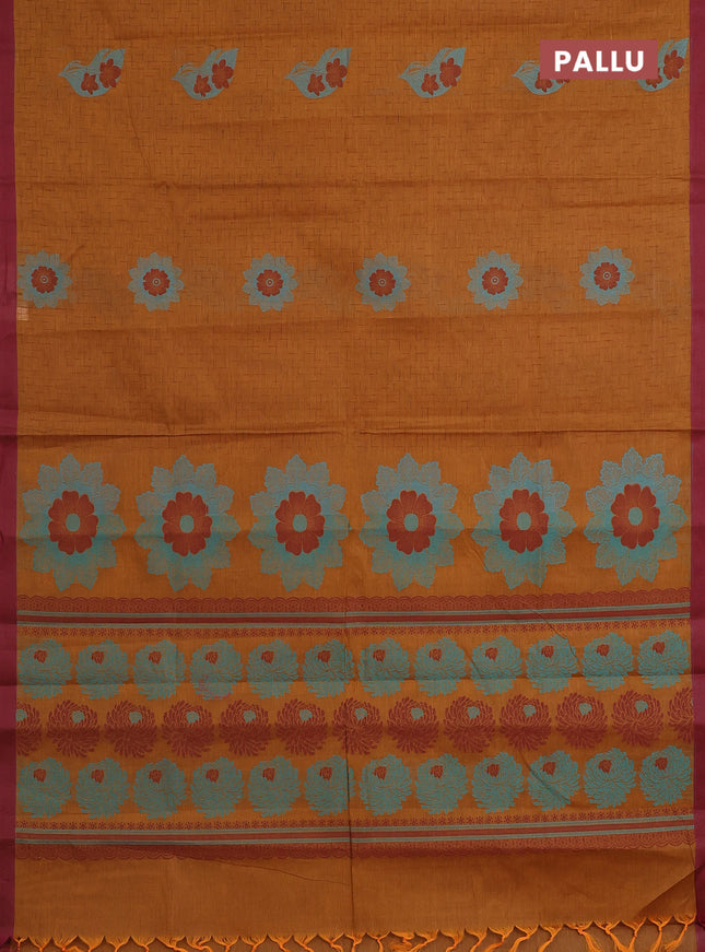 Nithyam cotton saree dark mustard and maroon with allover thread weaves and simple border