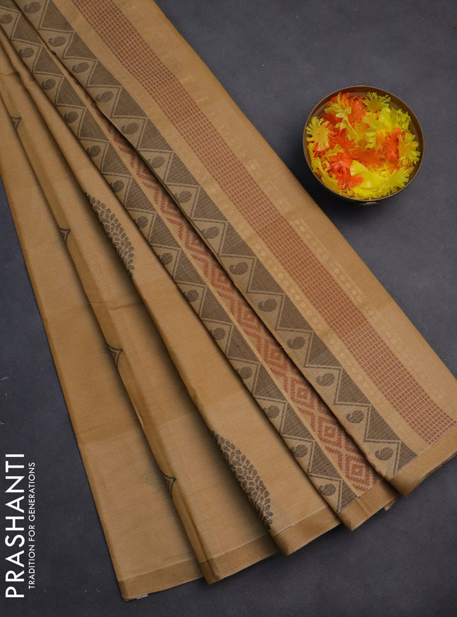 Nithyam cotton saree sandal with thread woven buttas and zari woven border